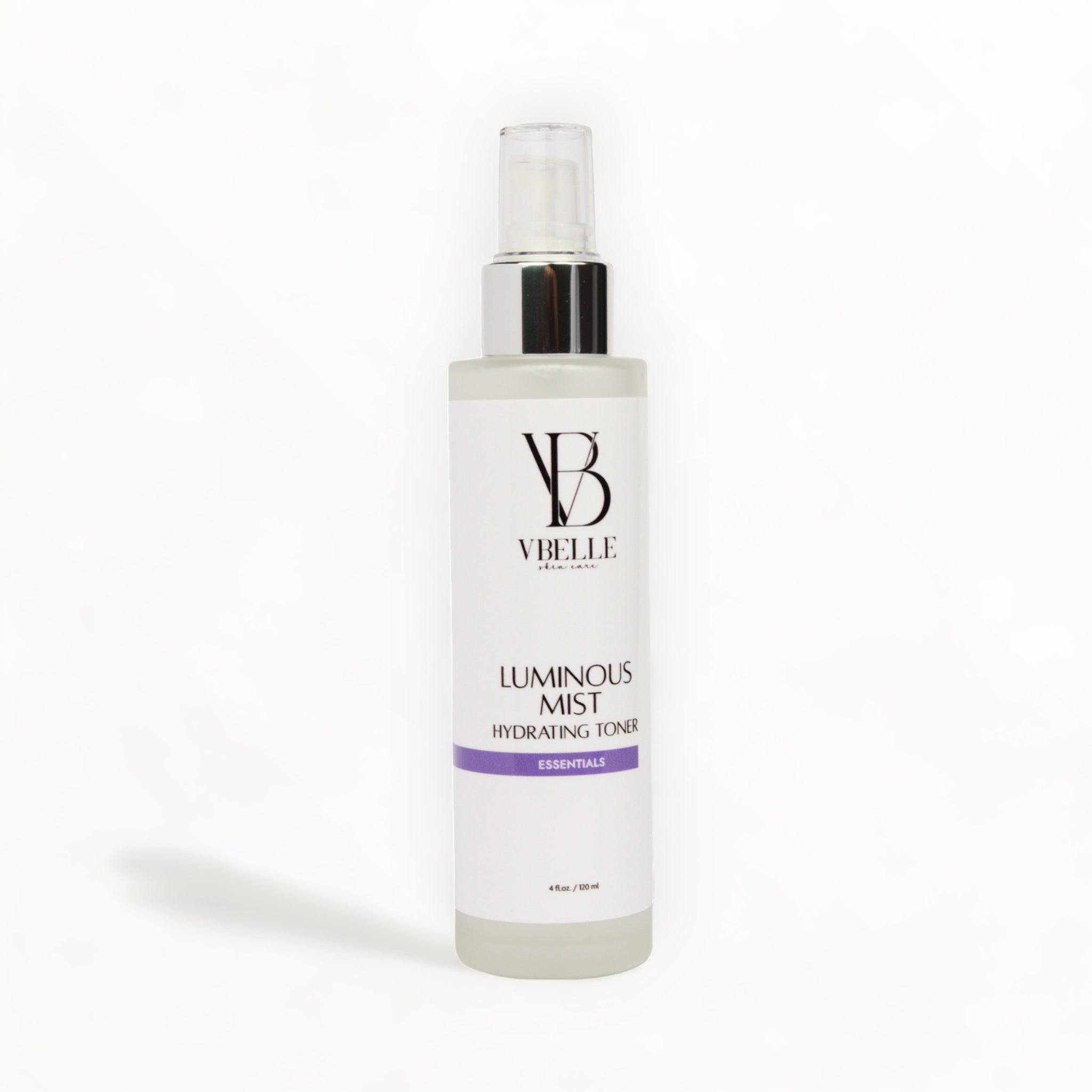Organic Luminous Mist Hydrating Toner 4 fl oz glass bottle on a multi color background