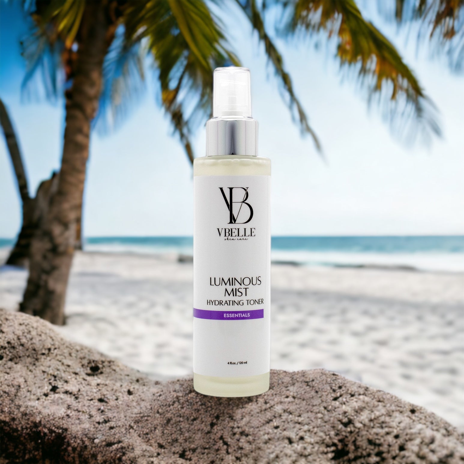 Luminous Mist Hydrating Toner on beach with palm trees