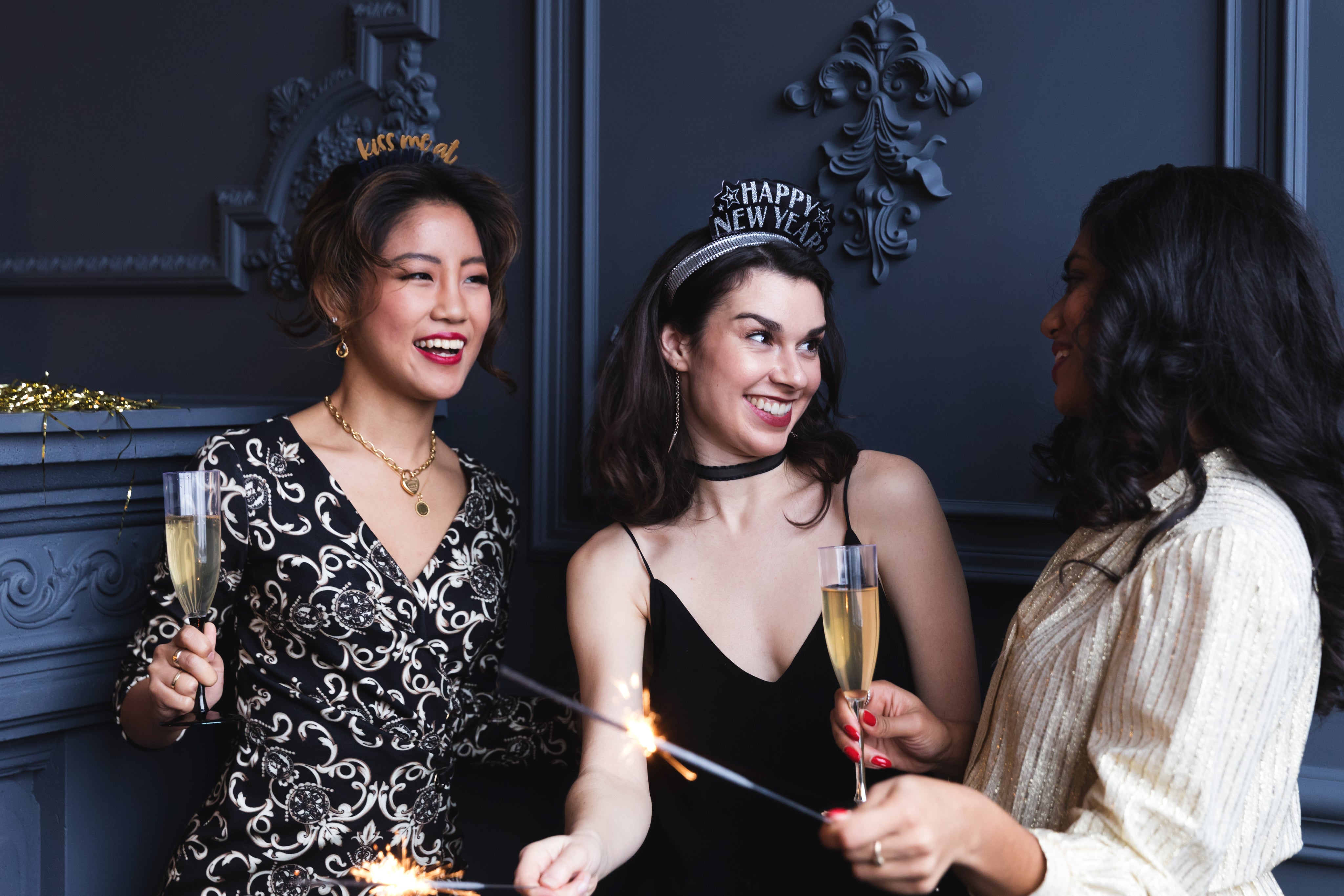 3 women celebrating at a new year's party 